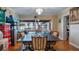 Bright dining room with ping pong table and lake view at 1241 W Lakeshore Dr, Clermont, FL 34711