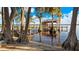 Private lakefront dock with stairs and upper deck at 1241 W Lakeshore Dr, Clermont, FL 34711