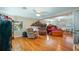 Hardwood floor bedroom with sitting area and en-suite bathroom at 1241 W Lakeshore Dr, Clermont, FL 34711