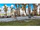 Sandy lakeside area with boats and dock in view at 1241 W Lakeshore Dr, Clermont, FL 34711