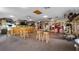 Spacious game room featuring a bar, seating, and entertainment at 1241 W Lakeshore Dr, Clermont, FL 34711