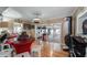 Large game room with hardwood floors and various game options at 1241 W Lakeshore Dr, Clermont, FL 34711