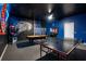 Game room with ping pong table, pool table, and Star Wars decor at 2226 Lelani Cir, Davenport, FL 33897