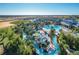 Resort-style pool with water slides and a large deck at 2226 Lelani Cir, Davenport, FL 33897