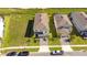 Aerial view of a house and neighborhood at 2226 Lelani Cir, Davenport, FL 33897