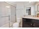Bathroom with shower, toilet, and granite countertop vanity at 2226 Lelani Cir, Davenport, FL 33897