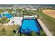 Blue basketball court and nearby pool at 2226 Lelani Cir, Davenport, FL 33897