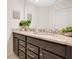 Double vanity bathroom with granite countertop at 2226 Lelani Cir, Davenport, FL 33897
