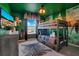 Jungle themed bedroom with bunk beds and fun decor at 2226 Lelani Cir, Davenport, FL 33897