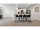 Modern kitchen with island and stainless steel appliances at 2720 Dumont Ln, Tavares, FL 32778
