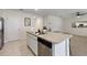 Eat-in kitchen with island and stainless steel appliances at 2720 Dumont Ln, Tavares, FL 32778