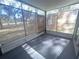 Bright screened porch with wooded views and plenty of natural light at 7874 Midway Drive Ter # V101, Ocala, FL 34472