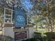 Derby Downs Condominium: A 55+ adult community entrance with a picturesque view at 7874 Midway Drive Ter # V101, Ocala, FL 34472