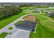 Aerial view of house and surrounding golf course at 17310 Se 116Th Court Rd, Summerfield, FL 34491