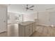 Open concept kitchen with island and stainless steel appliances at 21342 S Buckhill Rd, Clermont, FL 34715