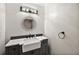 Modern bathroom with farmhouse sink and updated fixtures at 21342 S Buckhill Rd, Clermont, FL 34715