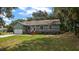 Charming ranch home with a detached garage and deck at 21342 S Buckhill Rd, Clermont, FL 34715