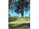Long private driveway leading to home, surrounded by lush pastures at 21342 S Buckhill Rd, Clermont, FL 34715