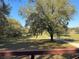 Long private driveway leading to home, surrounded by lush pastures at 21342 S Buckhill Rd, Clermont, FL 34715