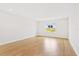 Bright bedroom with wood-look floors and golf course view at 15623 Vetta Dr, Montverde, FL 34756