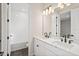 Clean bathroom with double vanity and white subway tile at 15623 Vetta Dr, Montverde, FL 34756