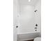 Simple bathroom with white subway tile and a bathtub at 15623 Vetta Dr, Montverde, FL 34756