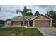 Image 1 of 25: 906 Palm Forest Ln, Minneola