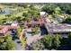 Large clubhouse with multiple buildings and parking at 26142 Avenida Las Colinas # 2B, Howey In The Hills, FL 34737