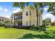 Two-story house with screened balcony, and a spacious yard at 26142 Avenida Las Colinas # 2B, Howey In The Hills, FL 34737