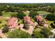 Aerial view of a cluster of homes, highlighting the community's architecture at 26142 Avenida Las Colinas # 2B, Howey In The Hills, FL 34737