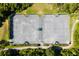 Three well-maintained tennis courts at 26142 Avenida Las Colinas # 2B, Howey In The Hills, FL 34737