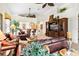 Open living area with comfortable seating and views to the kitchen at 26142 Avenida Las Colinas # 2B, Howey In The Hills, FL 34737