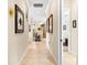 Bright hallway with tile floors and access to other rooms at 26142 Avenida Las Colinas # 2B, Howey In The Hills, FL 34737