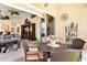 Relaxing patio with table and chairs, offering views of the living room at 26142 Avenida Las Colinas # 2B, Howey In The Hills, FL 34737