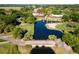 Aerial view of resort near a lake and golf course at 26142 Avenida Las Colinas # 2B, Howey In The Hills, FL 34737