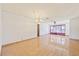 Bright dining room with tile floors and a chandelier at 9930 County Road 114B, Wildwood, FL 34785