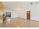Bright dining room with tile floors and a chandelier at 9930 County Road 114B, Wildwood, FL 34785