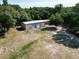 Aerial view of property showing detached workshop at 1921 Smitty Rd, Lady Lake, FL 32159