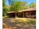 Brick home with walkway leading to front entrance at 1921 Smitty Rd, Lady Lake, FL 32159