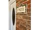 House number 1921 on brick facade at 1921 Smitty Rd, Lady Lake, FL 32159