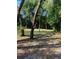 Wooded homesite with open grassy area and mature trees at 1921 Smitty Rd, Lady Lake, FL 32159