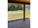 Spacious backyard with lush green grass and mature trees at 1921 Smitty Rd, Lady Lake, FL 32159