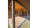 Covered patio with brick pavers and ceiling fan at 1921 Smitty Rd, Lady Lake, FL 32159