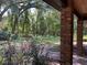 Brick pillars frame a view of the expansive backyard at 1921 Smitty Rd, Lady Lake, FL 32159