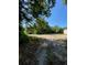 Partly sunny land with tire tracks and trees at 1921 Smitty Rd, Lady Lake, FL 32159
