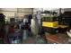 Workshop with ample storage shelving and various tools at 1921 Smitty Rd, Lady Lake, FL 32159
