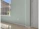 Cozy bedroom with large window, light walls, and carpeted floor at 12176 Se 91St Ave, Summerfield, FL 34491