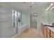 Bathroom with soaking tub, shower, and double vanity at 12176 Se 91St Ave, Summerfield, FL 34491