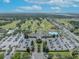 Large community center with ample parking and golf course views at 12176 Se 91St Ave, Summerfield, FL 34491