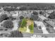 Aerial view of a house and yard in a residential neighborhood at 12176 Se 91St Ave, Summerfield, FL 34491